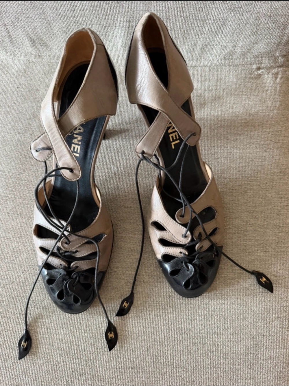 CHANEL Spectator T-Strap Pumps - a beige Gray & Black Patent Leather